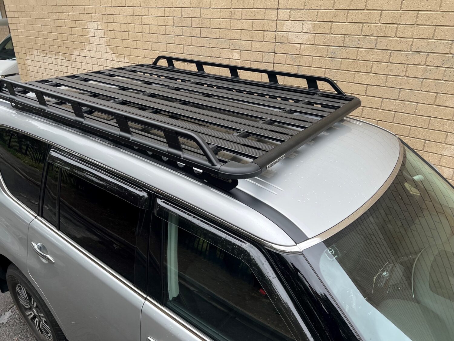 Nissan Patrol Y62 FaceLift 2021on RhinoRack Pioneer Tradie with Backbone (2128mmx1426mm