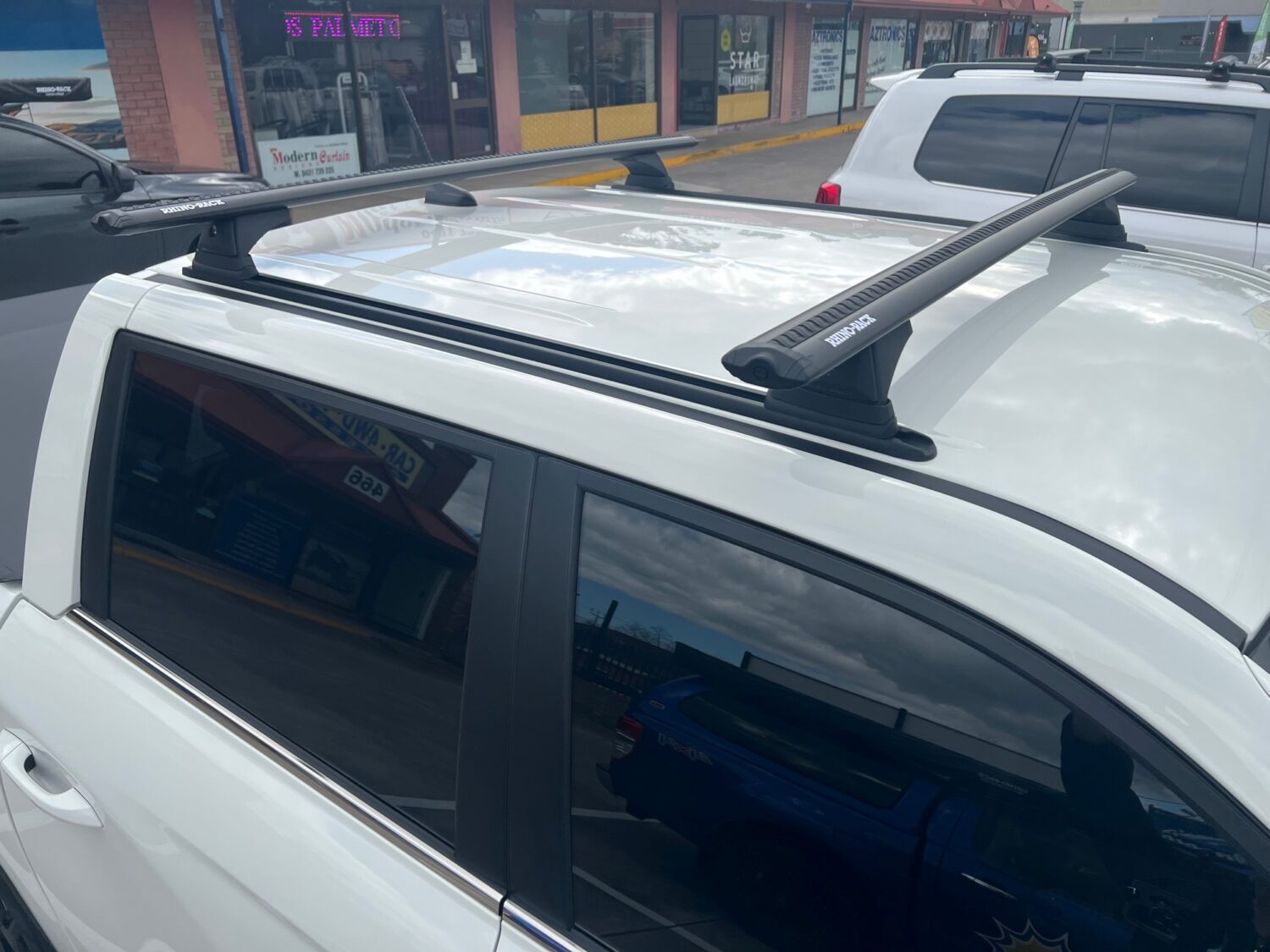 Ssangyong Musso 2021on RhinoRack Vortex Track Mounted Roof Racks (pr